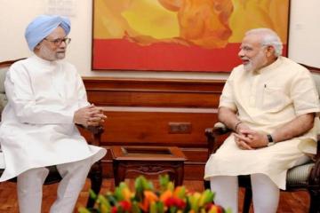 Modi invites Manmohan to talk economics