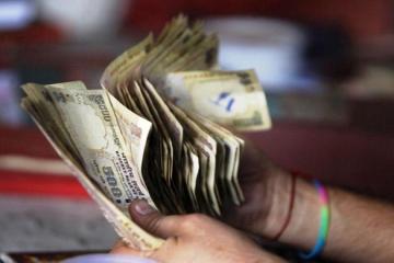 Centre brings black money into force