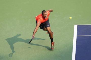Djokovic blows away Tomic