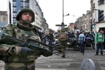 Fate of Paris attacks mastermind unclear after bloody raid