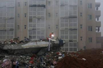 First body recovered from China landslide, 81 still missing