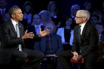 Seeking support for actions on gun control, Obama tears into gun lobby