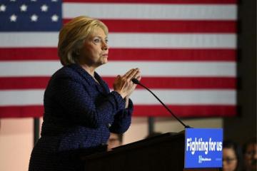 Sanders attacks Clinton over Wall Street ties