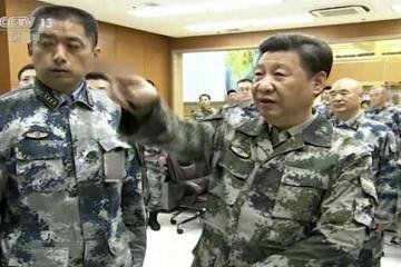 Xi takes Commander-in-Chief title as military reforms peak